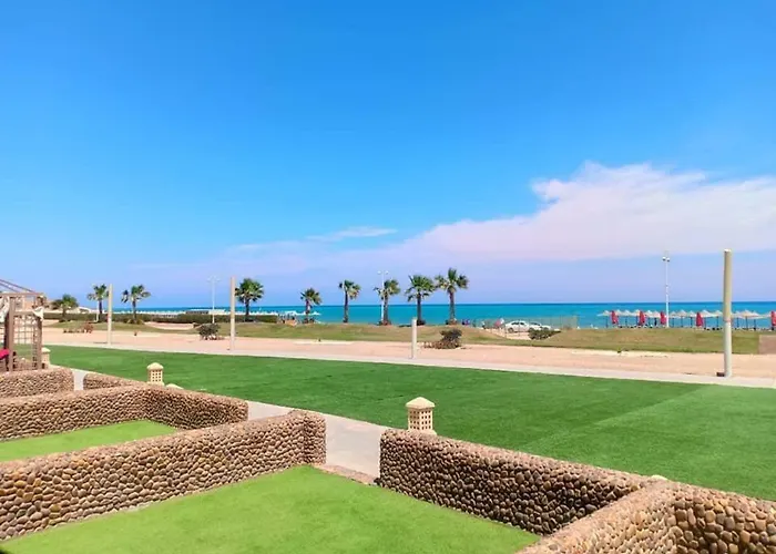Porto South Beach Chalet , First Row On The Sea Апарт-отель Айн-Сохна