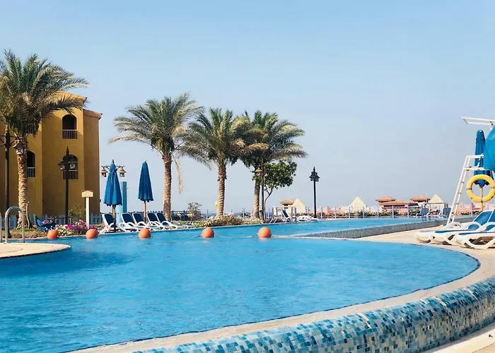 Апарт-отель Porto South Beach Chalet , First Row On The Sea Айн-Сохна